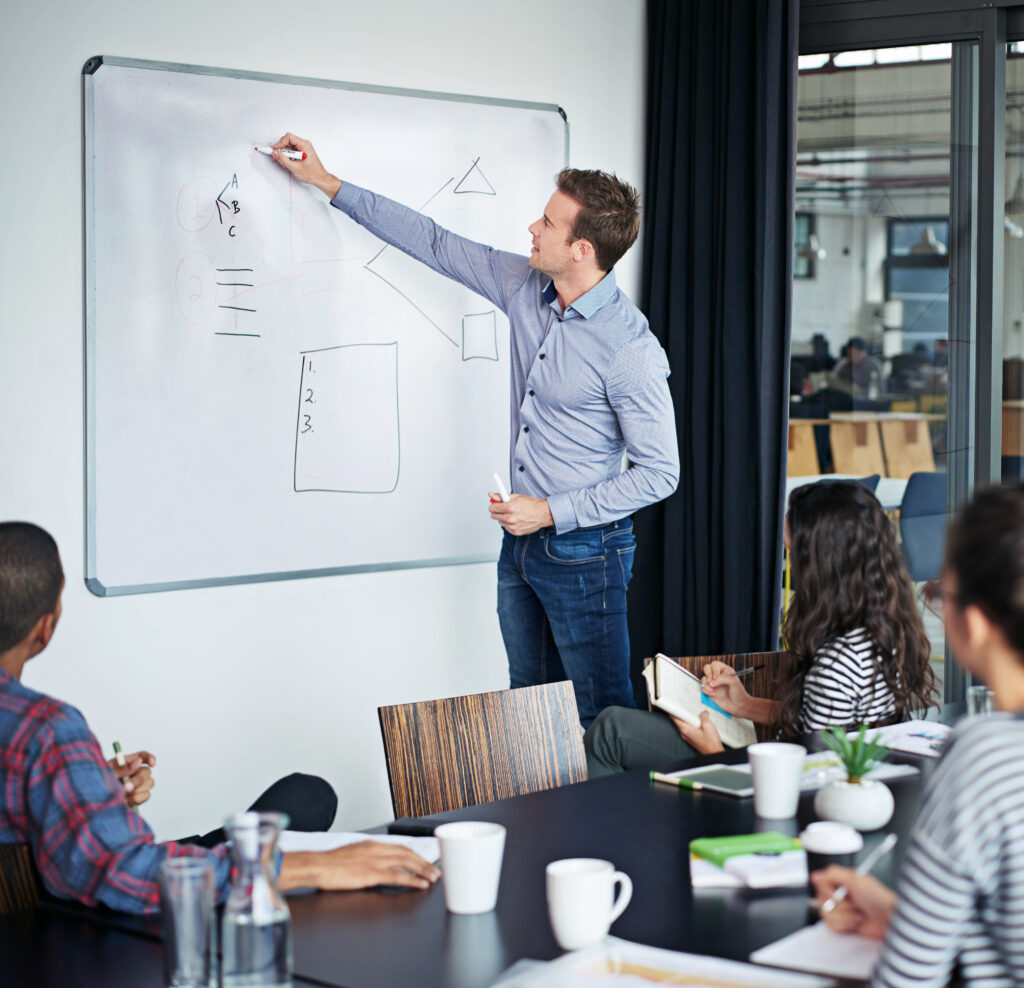 Cropped shot of a businessman giving a presentation in the boardroom.